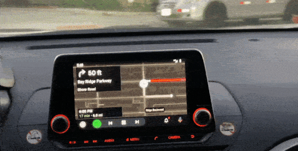 A car's infotainment screen, displaying Dashboard app during car connectivity.